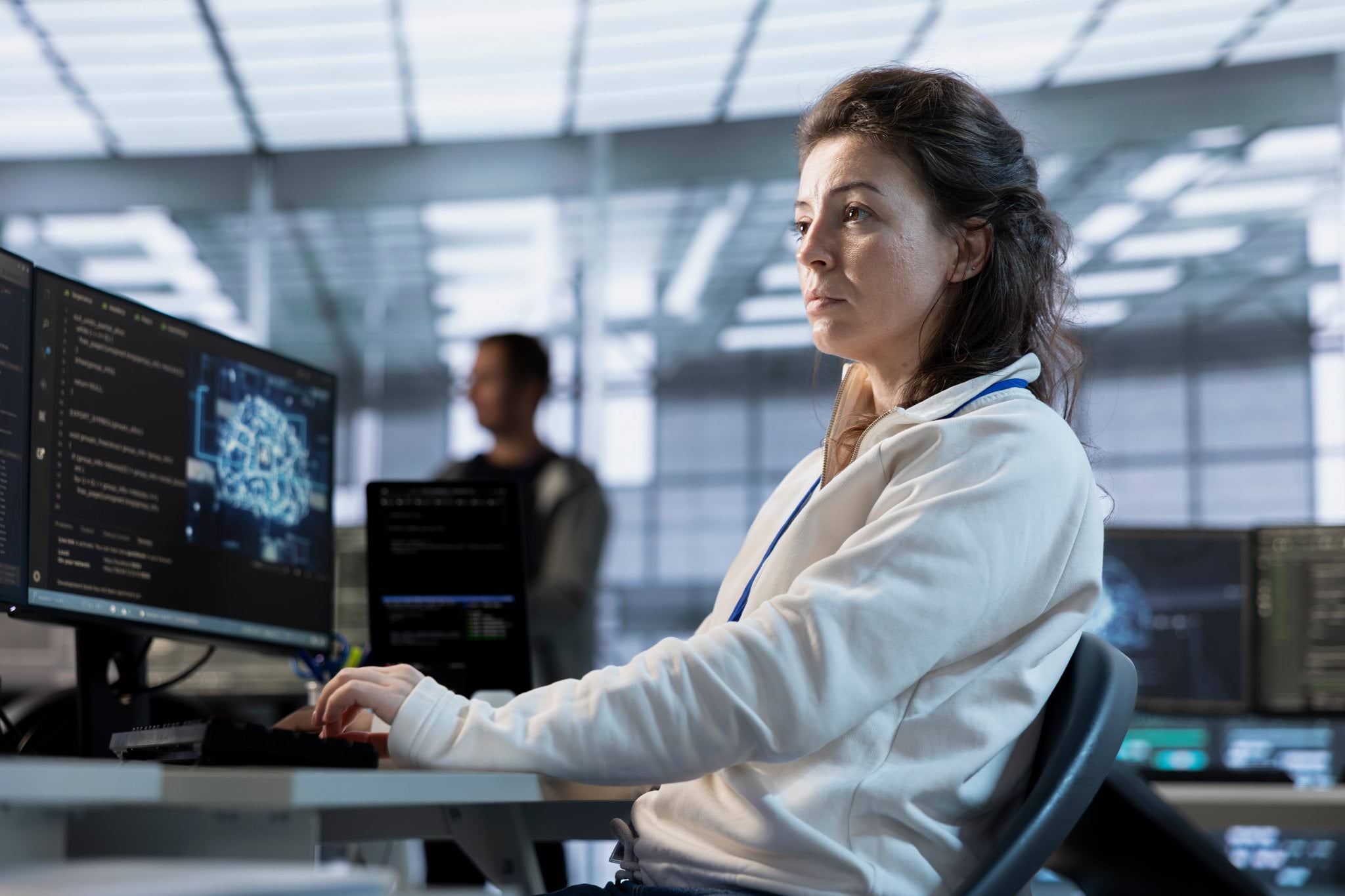 Female cyber professional looking at screen